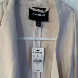 Express trench coat XS with tags, retails $148.00